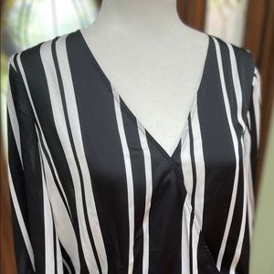 Inc black and white long sleeved blouse.